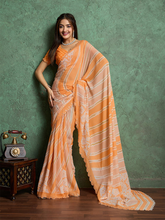 Poly Chiffon Leheriya Printed Saree With A Floral Touch And Swaroski Work With Scalloping Poly Chiffon Leheriya Printed Saree With A Floral Touch And Swaroski Work With Scalloping