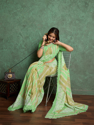 Poly Chiffon Leheriya Printed Saree With A Floral Touch And Swaroski Work With Scalloping