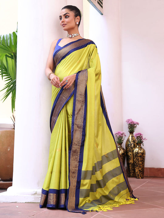 Green Kanjeevaram Silk Blend Woven Design Zari Saree With Blouse Piece Green Kanjeevaram Silk Blend Woven Design Zari Saree With Blouse Piece