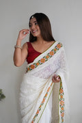 Off White Georgette Saree with Red Blouse Piece Off White Georgette Saree with Red Blouse Piece