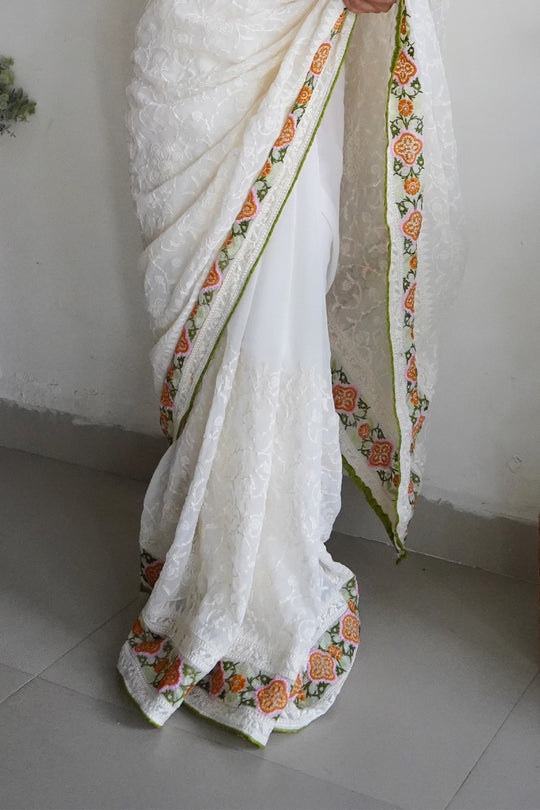 Off White Georgette Saree with Red Blouse Piece Off White Georgette Saree with Red Blouse Piece