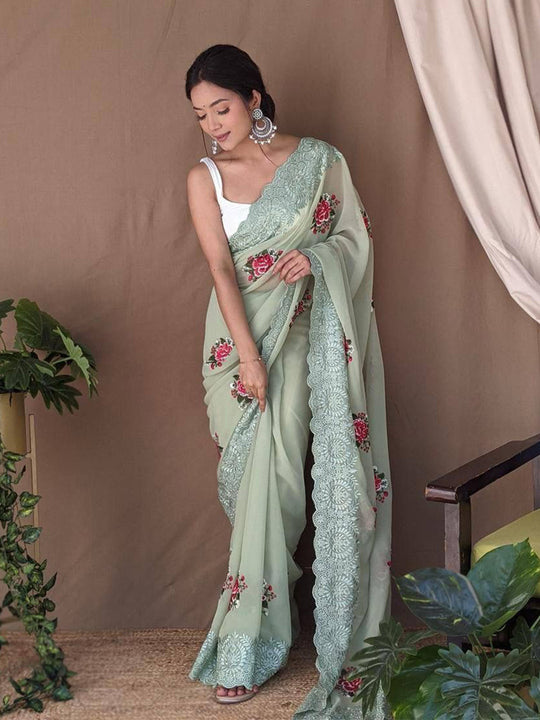 Green Georgette silk Saree With Blouse Piece Green Georgette silk Saree With Blouse Piece