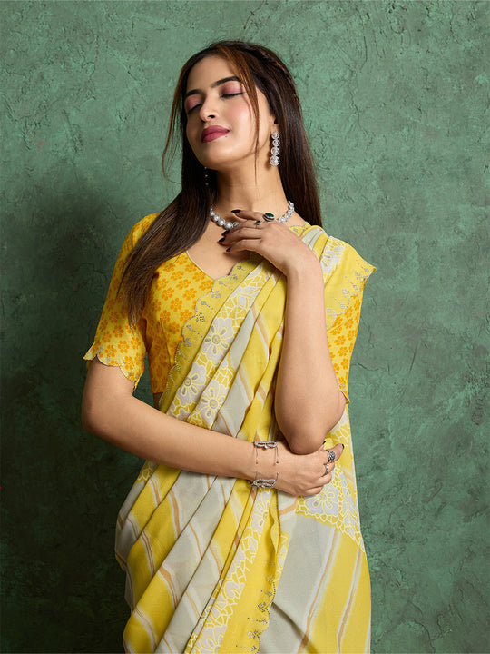 Poly Chiffon Leheriya Printed Saree With A Floral Touch And Swaroski Work With Scalloping