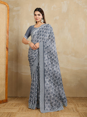 Poly Georgette Geometric Printed Saree With Embroidered Border And Blouse Piece