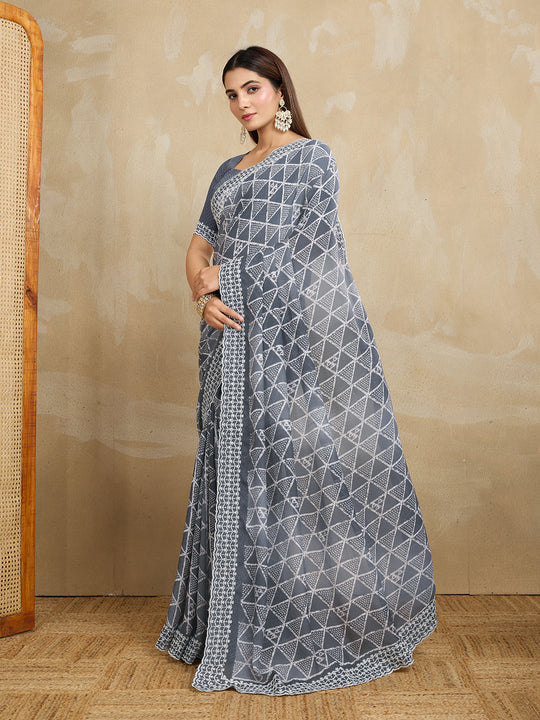 Poly Georgette Geometric Printed Saree With Embroidered Border And Blouse Piece