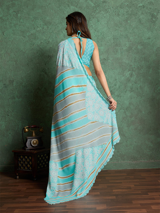 Poly Chiffon Leheriya Printed Saree With A Floral Touch And Swaroski Work With Scalloping