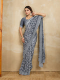 Poly Georgette Geometric Printed Saree With Embroidered Border And Blouse Piece