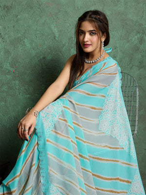 Poly Chiffon Leheriya Printed Saree With A Floral Touch And Swaroski Work With Scalloping