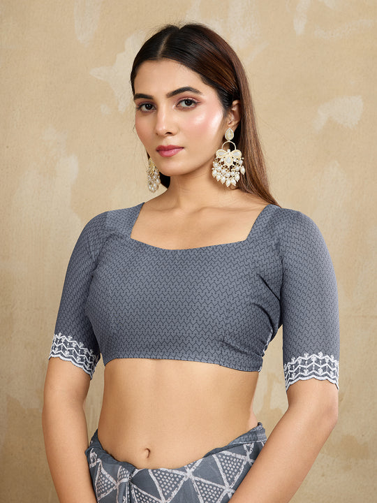 Poly Georgette Geometric Printed Saree With Embroidered Border And Blouse Piece