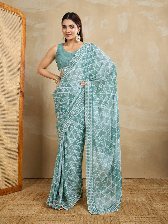 Poly Georgette Geometric Printed Saree With Embroidered Border And Blouse Piece