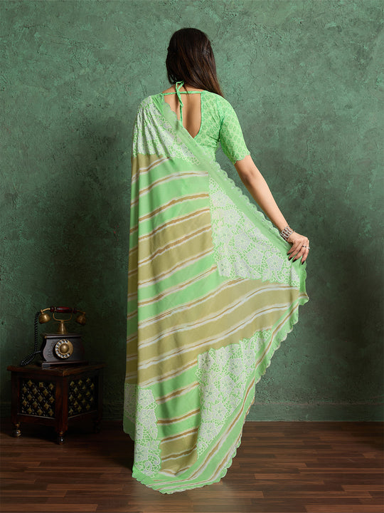 Poly Chiffon Leheriya Printed Saree With A Floral Touch And Swaroski Work With Scalloping