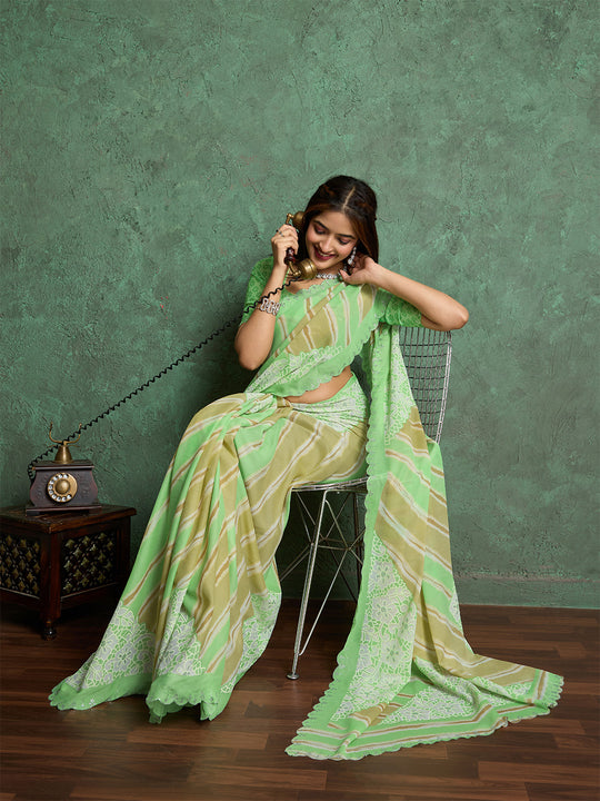 Poly Chiffon Leheriya Printed Saree With A Floral Touch And Swaroski Work With Scalloping