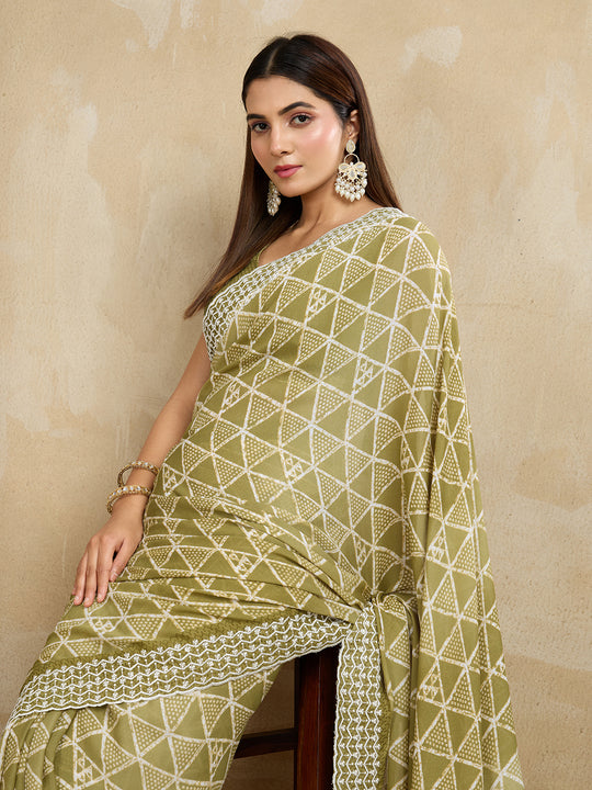 Poly Georgette Geometric Printed Saree With Embroidered Border And Blouse Piece