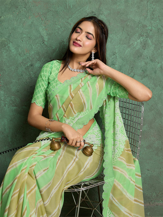 Poly Chiffon Leheriya Printed Saree With A Floral Touch And Swaroski Work With Scalloping