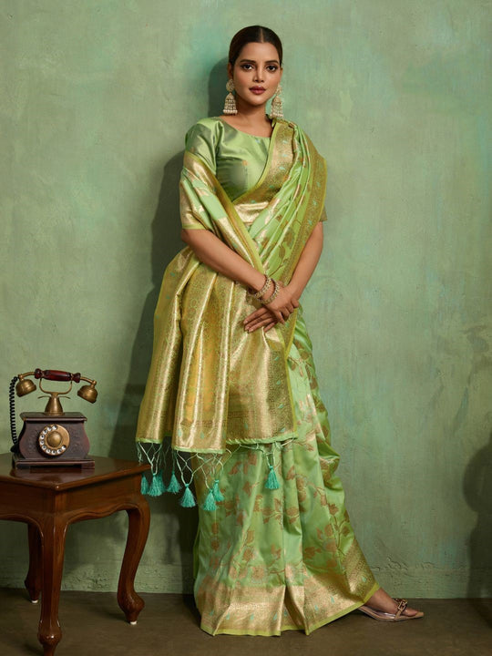 Dual Tone Banarasi Silk With Golden Zari Woven In Iconic Banarasi Jaal Pattern With Meenakari Hues Throughout Attached Dual Color Jhallar With Fumka