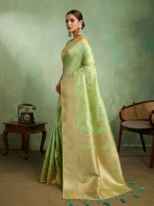 Dual Tone Banarasi Silk With Golden Zari Woven In Iconic Banarasi Jaal Pattern With Meenakari Hues Throughout Attached Dual Color Jhallar With Fumka