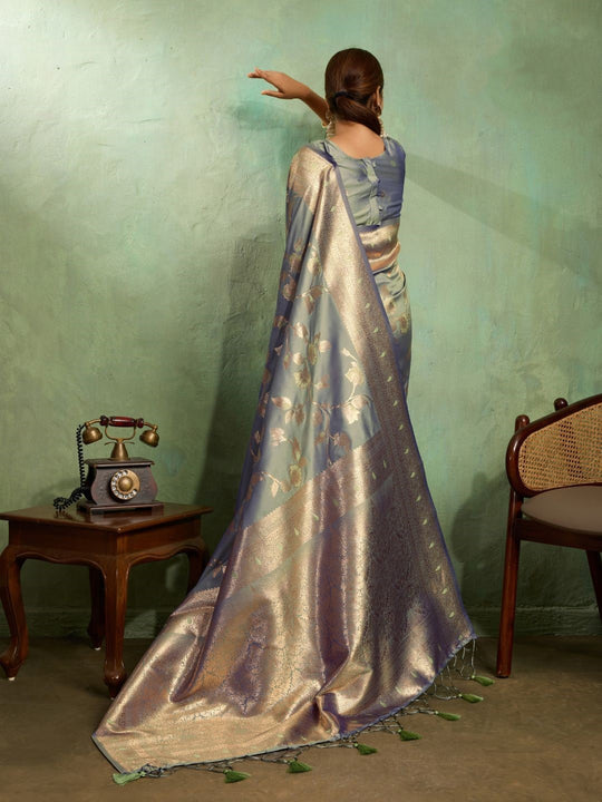 Dual Tone Banarasi Silk With Golden Zari Woven In Iconic Banarasi Jaal Pattern With Meenakari Hues Throughout Attached Dual Color Jhallar With Fumka