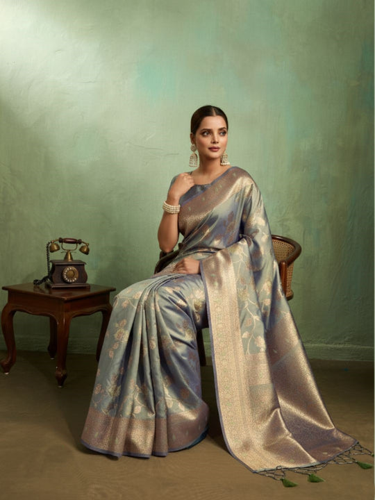 Dual Tone Banarasi Silk With Golden Zari Woven In Iconic Banarasi Jaal Pattern With Meenakari Hues Throughout Attached Dual Color Jhallar With Fumka