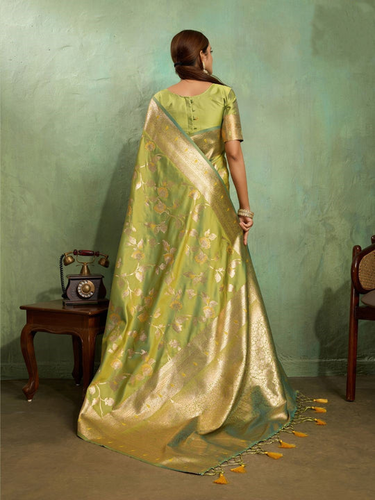 Dual Tone Banarasi Silk With Golden Zari Woven In Iconic Banarasi Jaal Pattern With Meenakari Hues Throughout Attached Dual Color Jhallar With Fumka