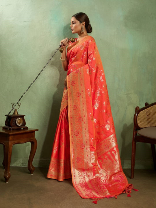 Dual Tone Banarasi Silk With Golden Zari Woven In Iconic Banarasi Jaal Pattern With Meenakari Hues Throughout Attached Dual Color Jhallar With Fumka