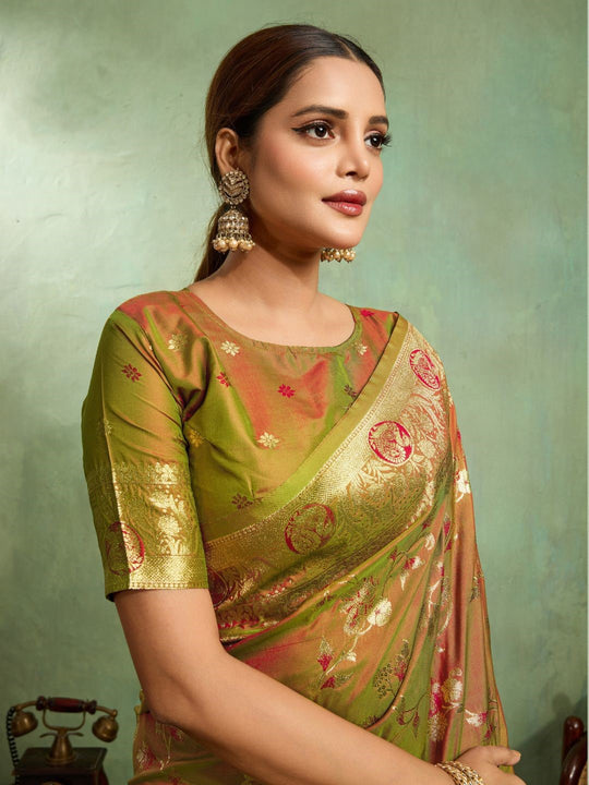 Dual Tone Banarasi Silk With Golden Zari Woven In Iconic Banarasi Jaal Pattern With Meenakari Hues Throughout Attached Dual Color Jhallar With Fumka
