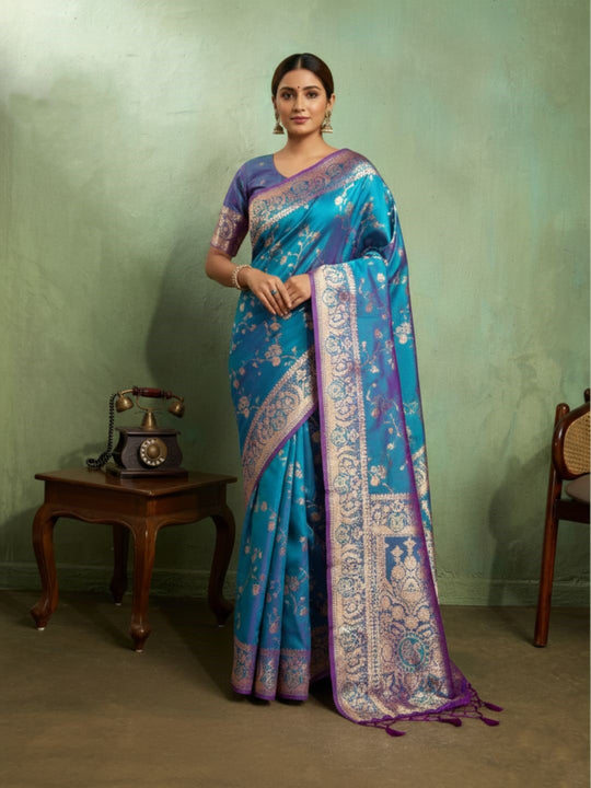 Dual Tone Banarasi Silk With Golden Zari Woven In Iconic Banarasi Jaal Pattern With Meenakari Hues Throughout Attached Dual Color Jhallar With Fumka
