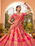 ORANGE BANARASI SILK WITH ZARKAN CODDING WORK  LEHENGA CHOLI