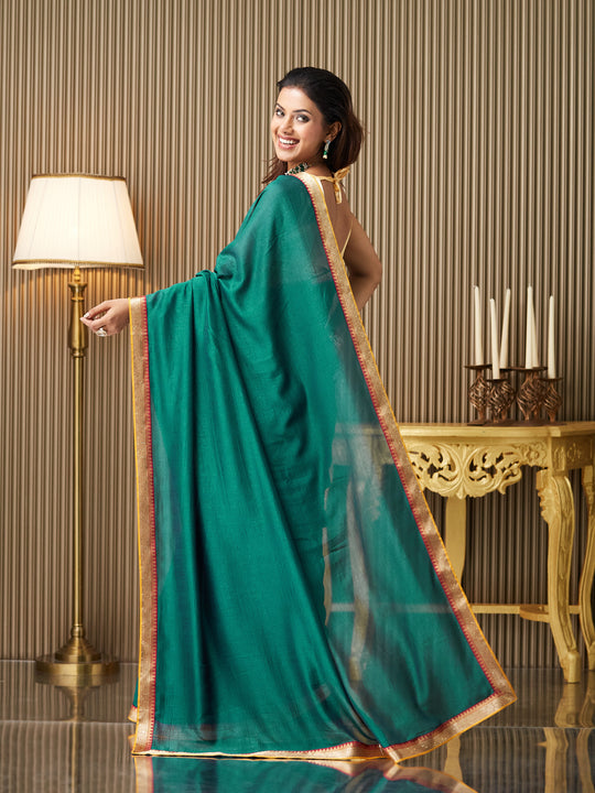 Green silk Solid Saree With Blouse Piece