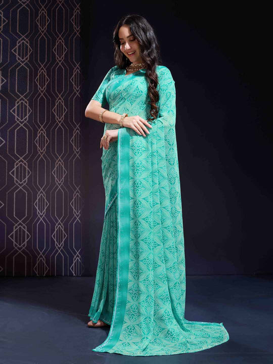 Turquoise Green Georgette Swarovski Stone Embellished Printed Saree With Blouse Piece