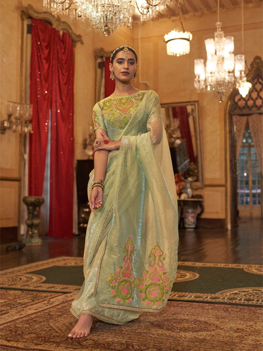 Gold Tissue Fabric With Multi Thread Embroidery Work And Lace Border Details.