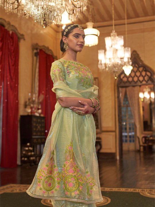 Gold Tissue Fabric With Multi Thread Embroidery Work And Lace Border Details.