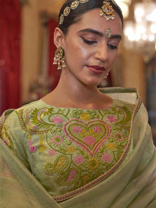 Gold Tissue Fabric With Multi Thread Embroidery Work And Lace Border Details.