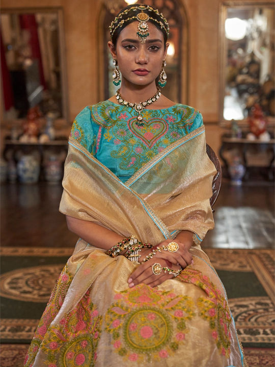 Gold Tissue Fabric With Multi Thread Embroidery Work And Lace Border Details.