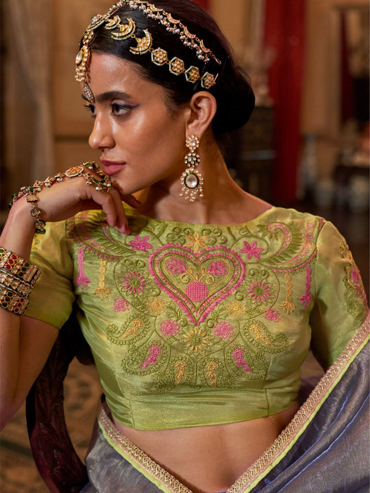 Gold Tissue Fabric With Multi Thread Embroidery Work And Lace Border Details.