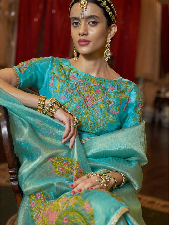 Gold Tissue Fabric With Multi Thread Embroidery Work And Lace Border Details.