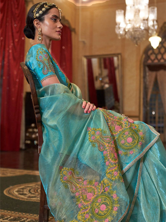 Gold Tissue Fabric With Multi Thread Embroidery Work And Lace Border Details.