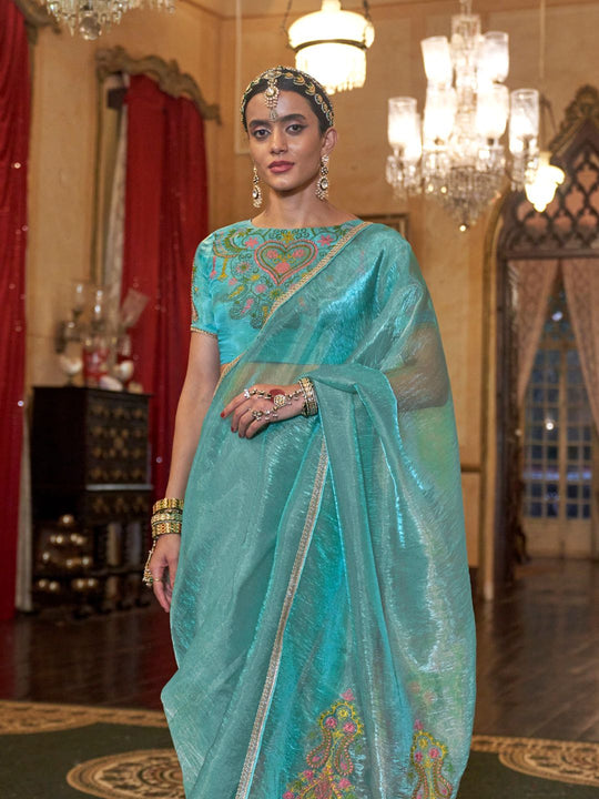 Gold Tissue Fabric With Multi Thread Embroidery Work And Lace Border Details.