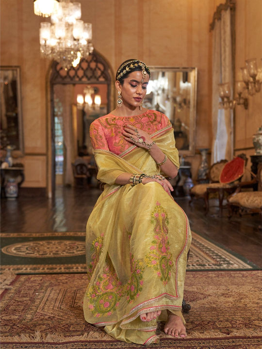 Gold Tissue Fabric With Multi Thread Embroidery Work And Lace Border Details.
