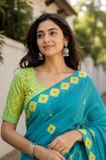 Teal Blue Printed Saree With Blouse Piece