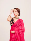 Pink Solid Organza Saree With Tassels And Heavy Embroidered Blouse