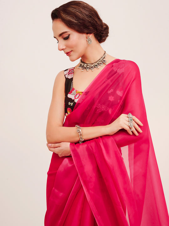 Pink Solid Organza Saree With Tassels And Heavy Embroidered Blouse
