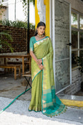 Green Semi Tussar Silk Saree With All Over Bandhani Style Butti Weaves And Very Well Designed Traditional Temple Border With Zari Linning Pallu And Blouse Piece