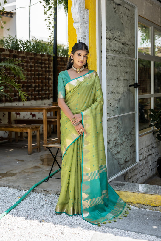 Green Semi Tussar Silk Saree With All Over Bandhani Style Butti Weaves And Very Well Designed Traditional Temple Border With Zari Linning Pallu And Blouse Piece