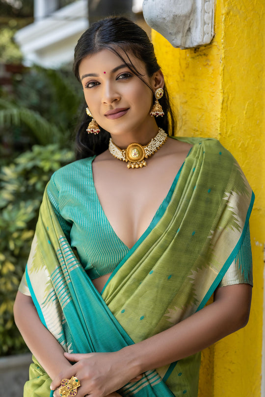 Green Semi Tussar Silk Saree With All Over Bandhani Style Butti Weaves And Very Well Designed Traditional Temple Border With Zari Linning Pallu And Blouse Piece