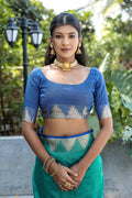 Blue Semi Tussar Silk Saree With All Over Bandhani Style Butti Weaves And Very Well Designed Traditional Temple Border With Zari Linning Pallu And Blouse Piece