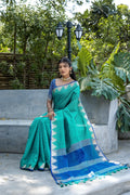 Blue Semi Tussar Silk Saree With All Over Bandhani Style Butti Weaves And Very Well Designed Traditional Temple Border With Zari Linning Pallu And Blouse Piece