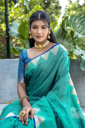 Blue Semi Tussar Silk Saree With All Over Bandhani Style Butti Weaves And Very Well Designed Traditional Temple Border With Zari Linning Pallu And Blouse Piece