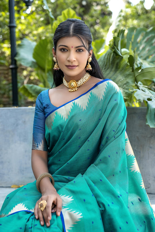 Blue Semi Tussar Silk Saree With All Over Bandhani Style Butti Weaves And Very Well Designed Traditional Temple Border With Zari Linning Pallu And Blouse Piece