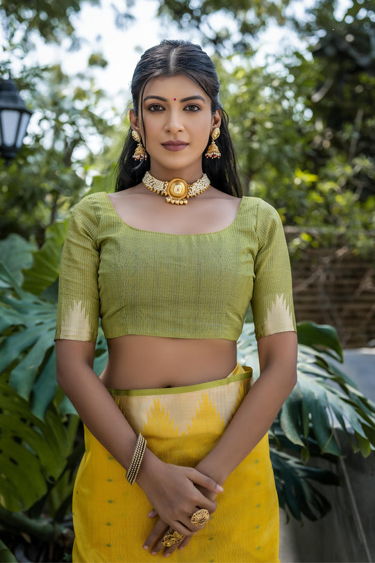 Yellow Semi Tussar Silk Saree With All Over Bandhani Style Butti Weaves And Very Well Designed Traditional Temple Border With Zari Linning Pallu And Blouse Piece