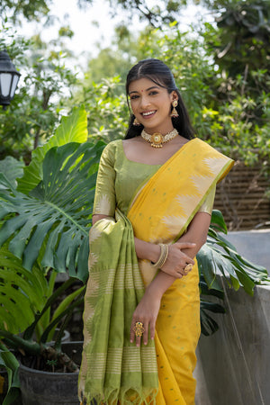 Yellow Semi Tussar Silk Saree With All Over Bandhani Style Butti Weaves And Very Well Designed Traditional Temple Border With Zari Linning Pallu And Blouse Piece